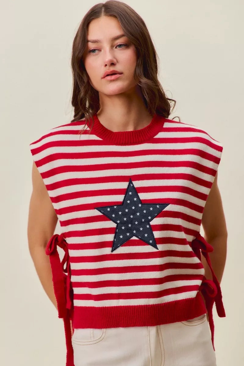 Red and ivory striped sleeveless vest top with large navy star patch and side ties