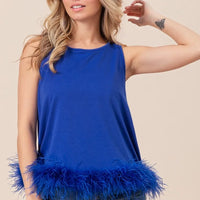 Royal blue sleeveless crewneck top with faux feather ruffle bottom