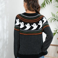 Black ghost-pattern button-up cardigan sweater showing full back and long sleeves