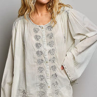 Pale grey embroidered button-front woven shirt with floral motifs and gathered cuffs