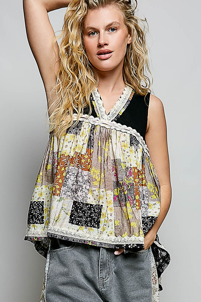 Black sheer floral V-neck tank with lace trim and multicolor patchwork squares
