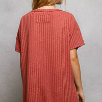 Terra cotta ribbed knit V-neck t-shirt back view with side slit