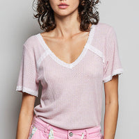 Baby pink textured V-neck short-sleeve T-shirt with white lace neckline trim