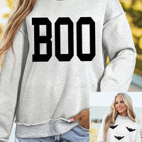 Light gray reversible mock-neck sweatshirt with black “BOO” front graphic and relaxed fit