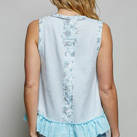 Powder blue back view ribbed tank with vertical floral print and ruffle trim