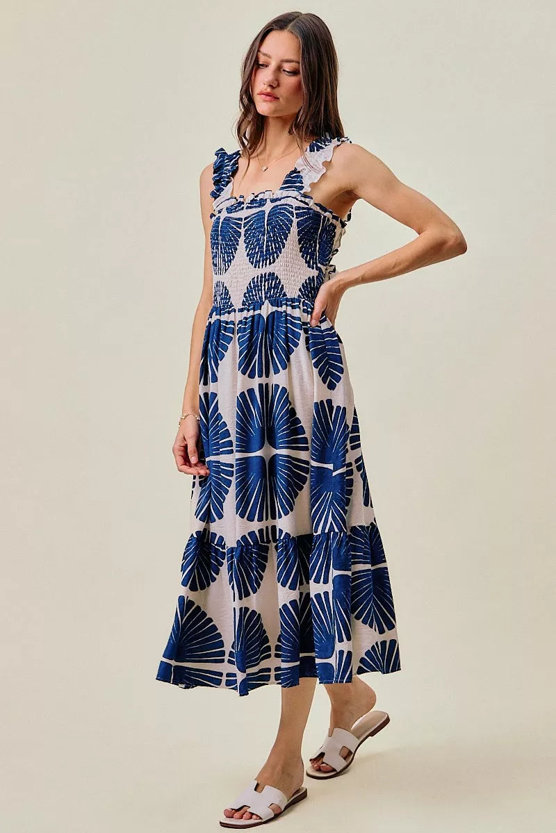 Navy abstract print tiered midi dress, smocked bodice, fitted bodice and flared skirt