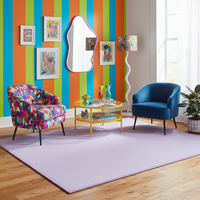 Pastel lavender rectangular rug with a textured top and stitched perimeter border.