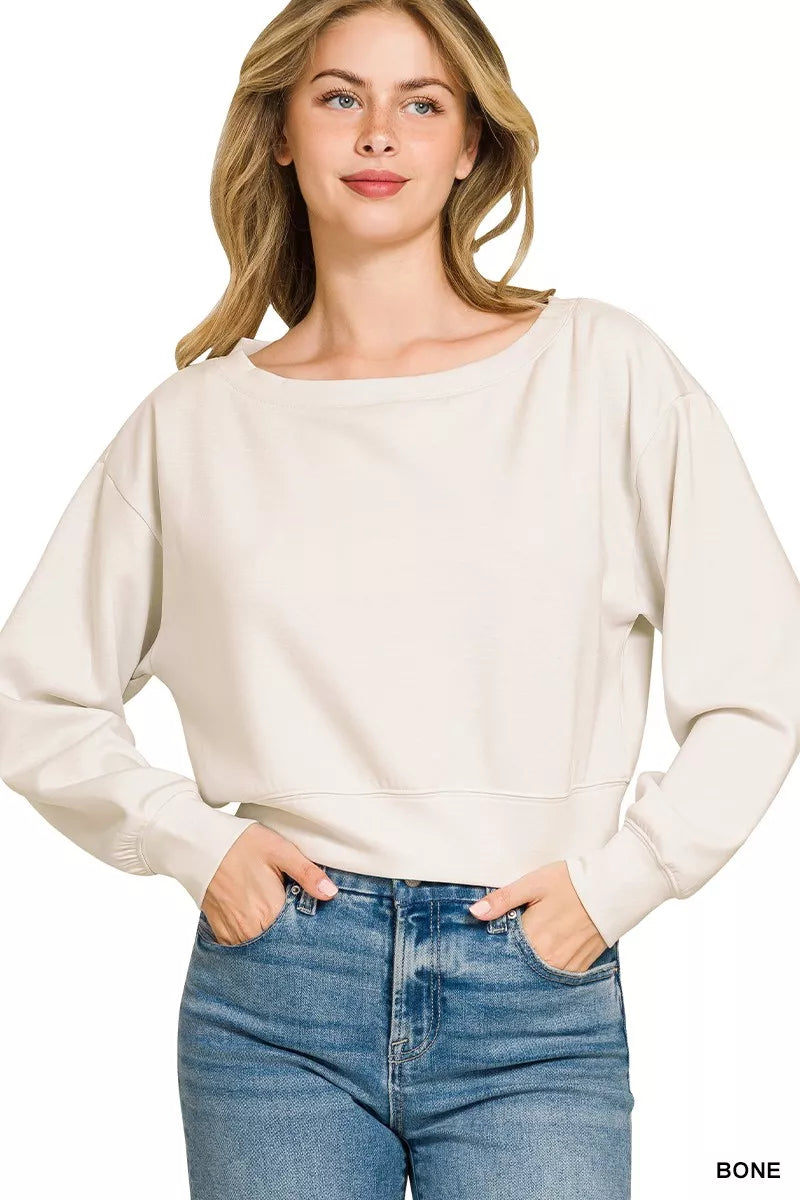 Bone cropped boat-neck pullover sweatshirt with long sleeves, relaxed fit