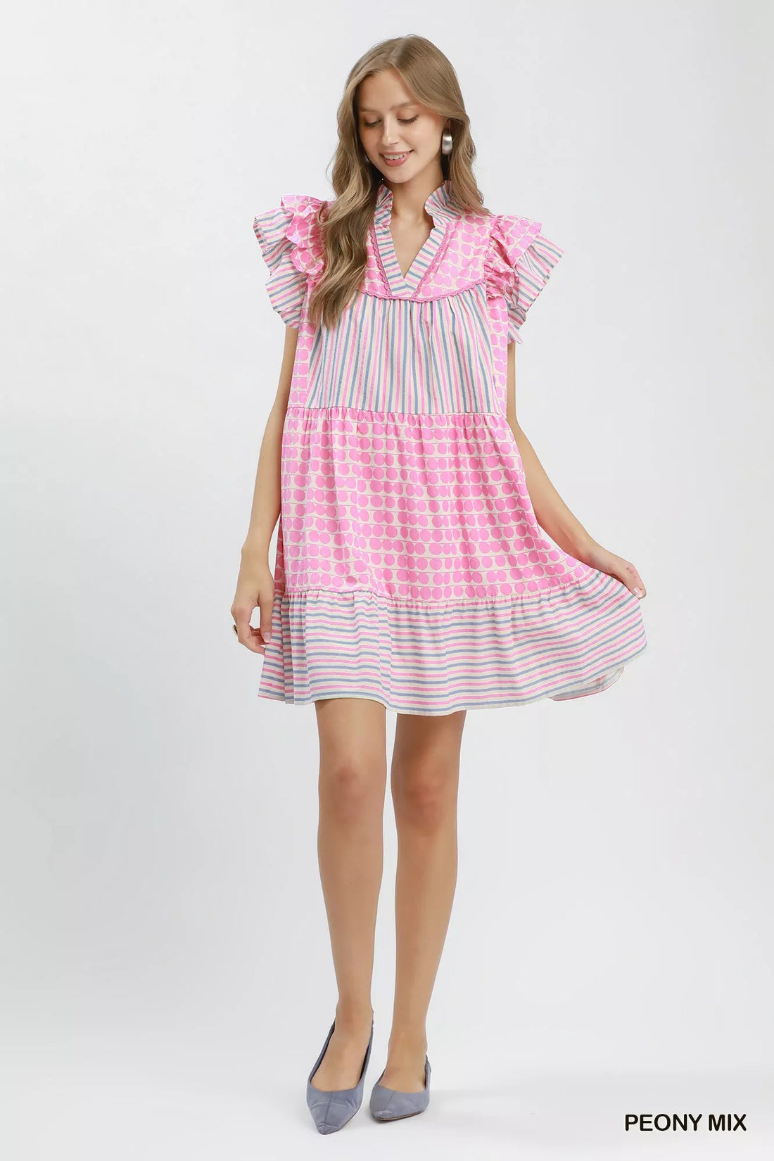 Pink tiered mini dress with flutter sleeves and V-neck, striped hem and dot print