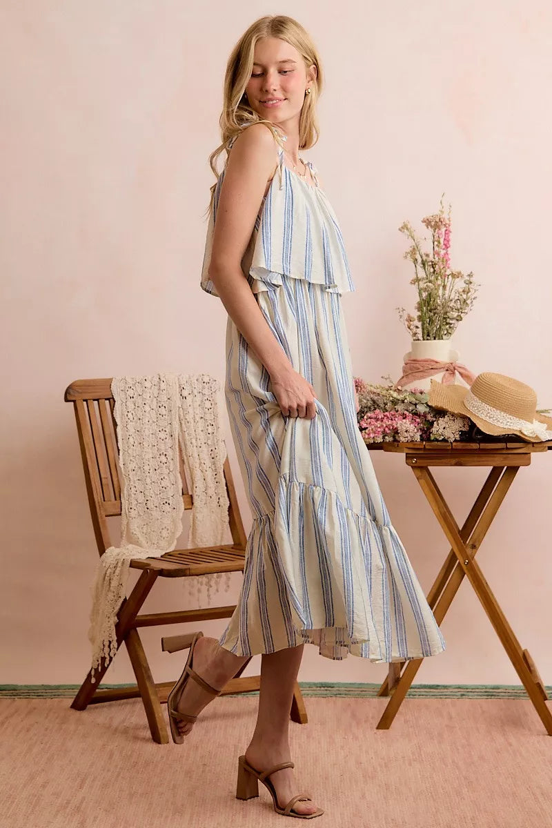Blue and white striped tiered midi dress with spaghetti tie shoulder straps