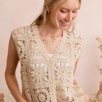 Natural crochet sleeveless vest with V-neck, front buttons, and textured granny-square motifs
