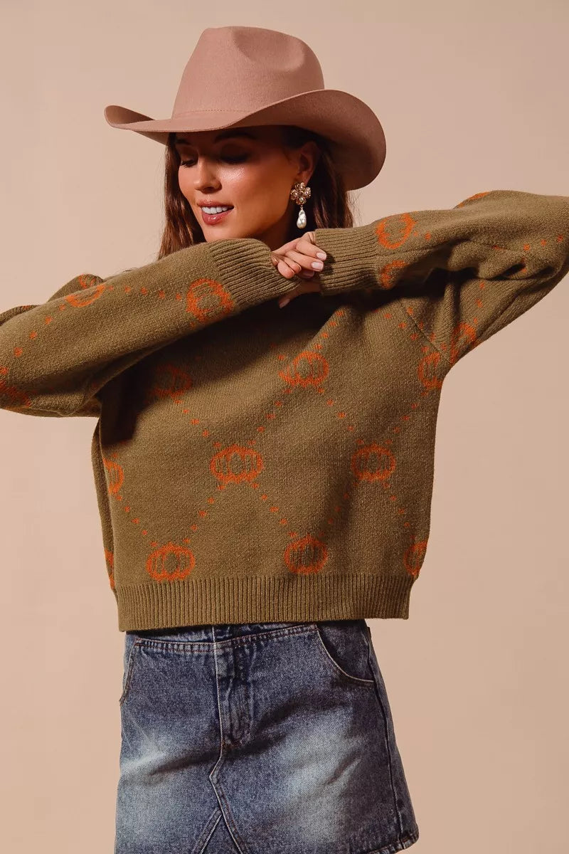 Olive crewneck pumpkin sweater with orange rhombus pattern, relaxed long sleeves