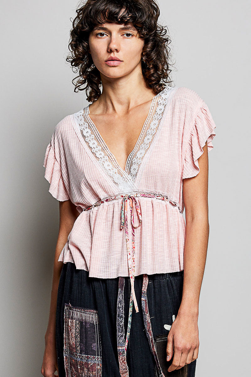 Blush pink striped peplum blouse with V-neck lace trim, ruffled short sleeves, tie waist