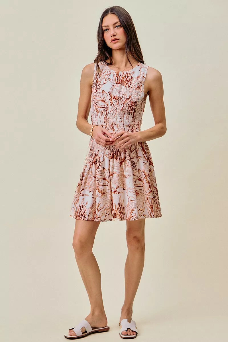 Shell print smocked sleeveless mini dress with fit-and-flare skirt, lined