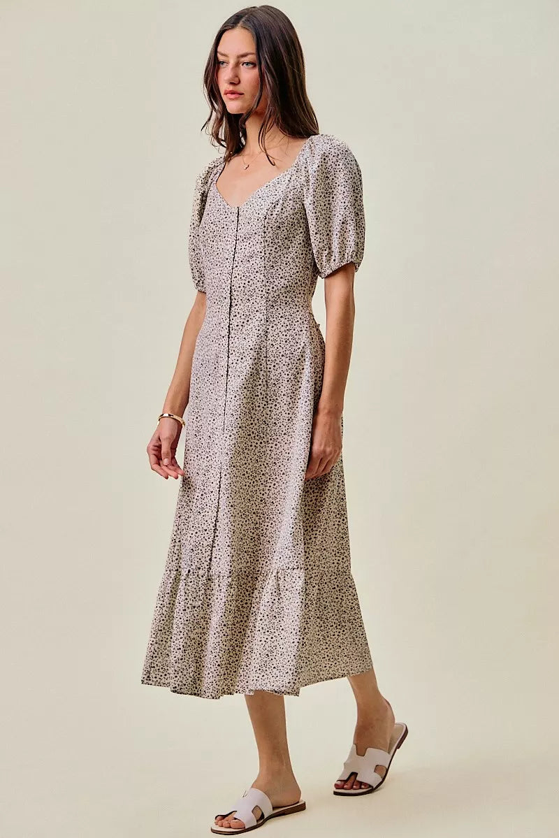 Ditsy floral midi dress with puff sleeves and elastic waist, front view, self belt tie