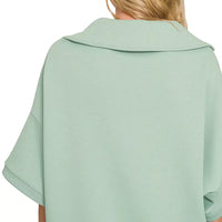 Dusty green collared pullover with short sleeves, back view