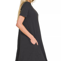 Black short-sleeve A-line dress with round neck and side pockets, side seam detail