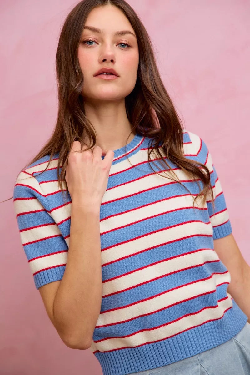 Striped knit crew neck short-sleeve sweater top; blue ribbed collar and red-white stripe pattern