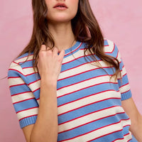 Striped knit crew neck short-sleeve sweater top; blue ribbed collar and red-white stripe pattern