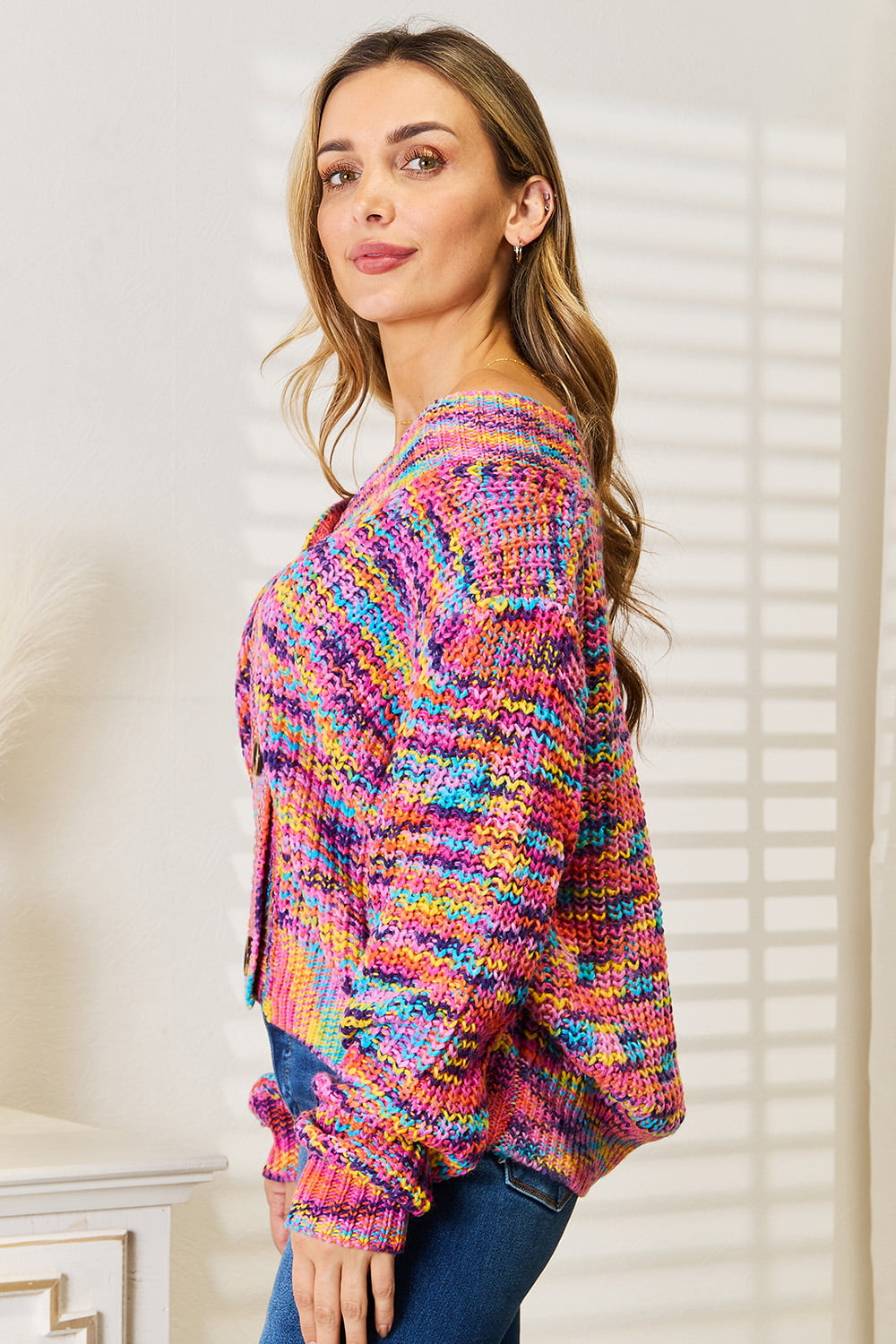 Multicolor knit cardigan with v-neckline, button placket, and long sleeves