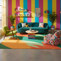 Abstract geometric area rug with orange, green, and teal angular leaf patterns