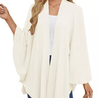 Ivory women’s shawl cape with open front drape and tied waist detail