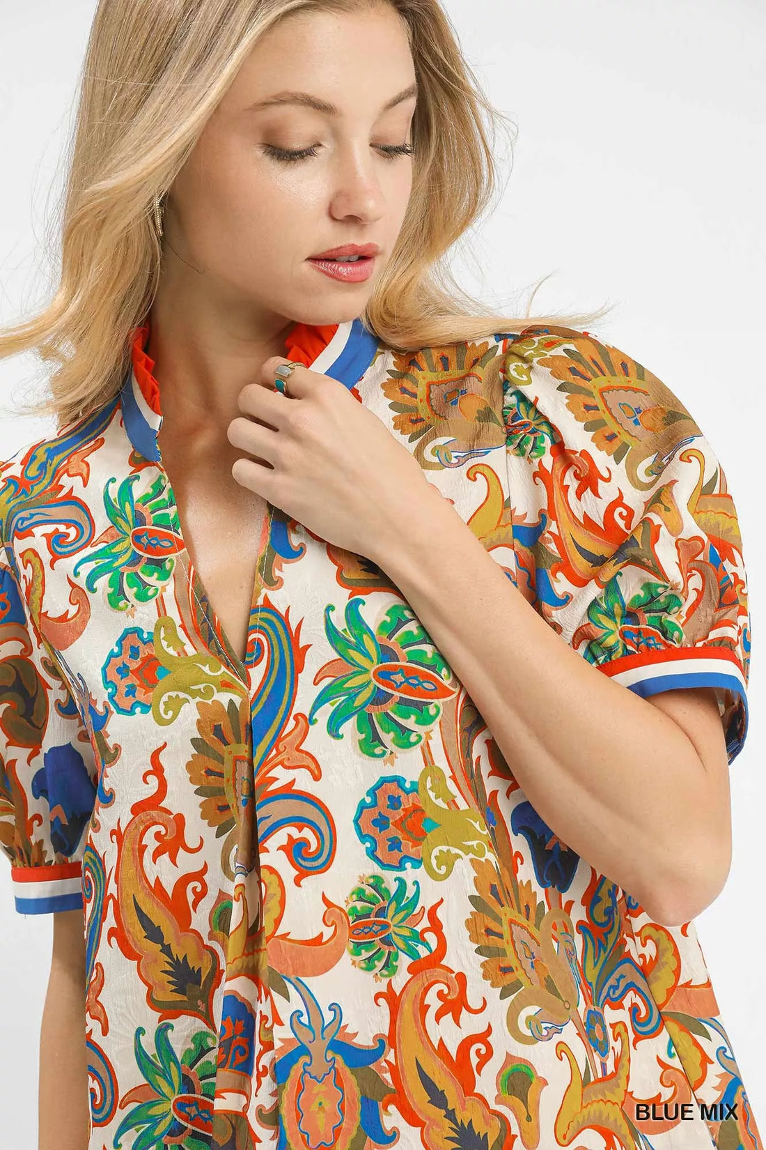 Blue mix abstract print mini dress close-up with collar and short sleeves