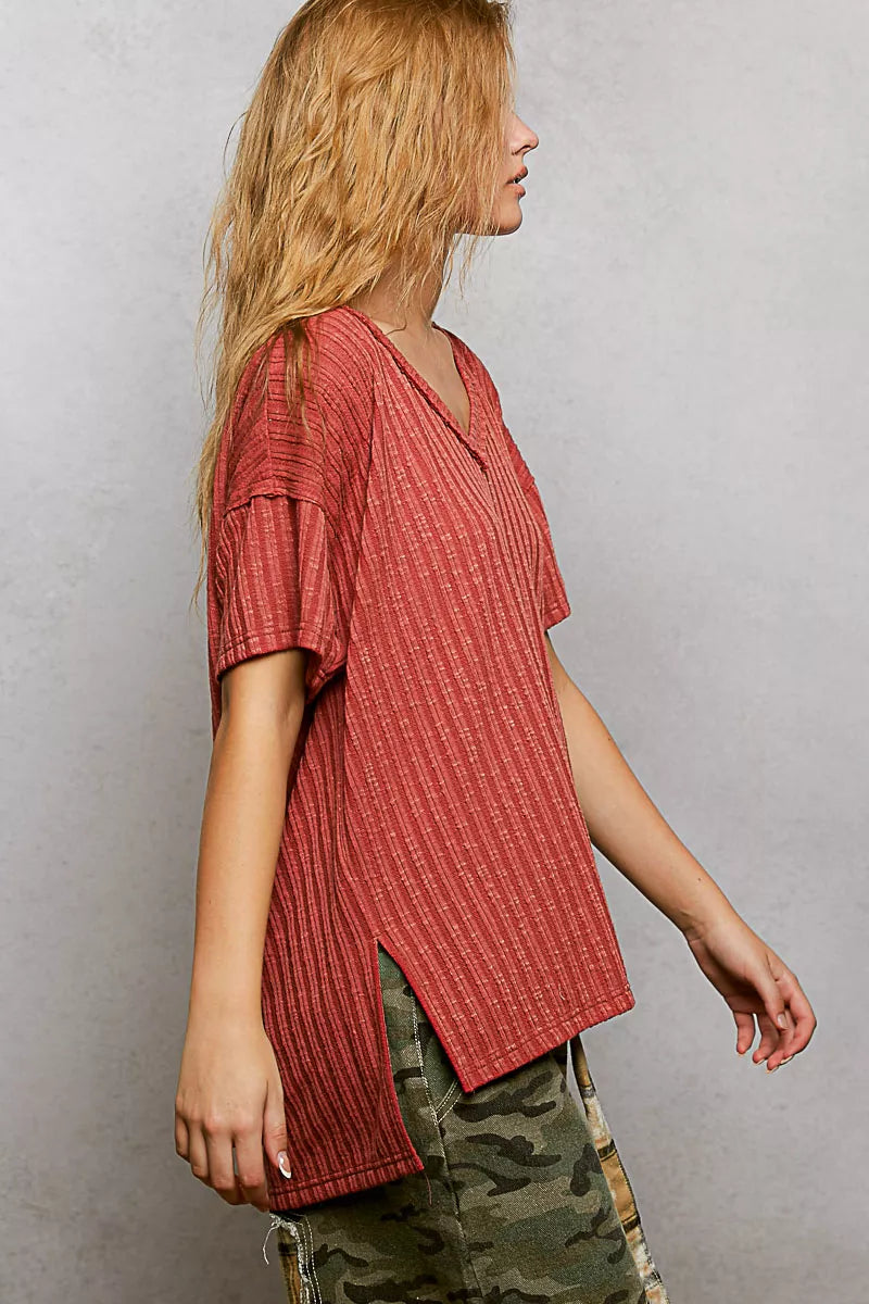 Terra cotta ribbed knit V-neck t-shirt with short sleeves and side slit detail