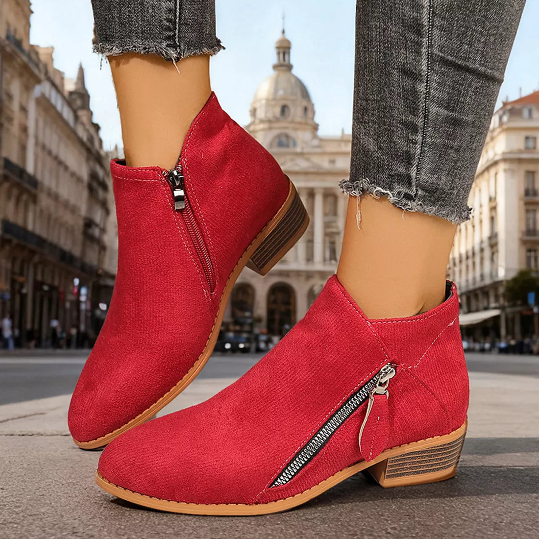 Red point-toe block heeled ankle boots with side zipper and textured block heel