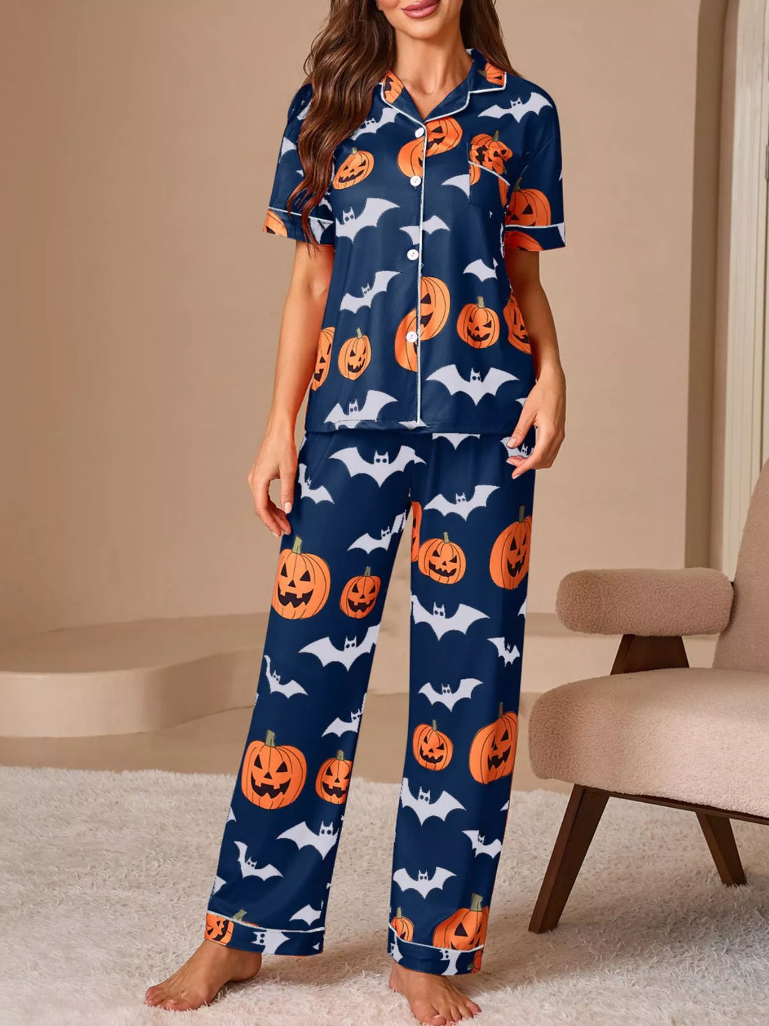 Navy Halloween pajama lounge set with pumpkin and bat print, short-sleeve button top and pants