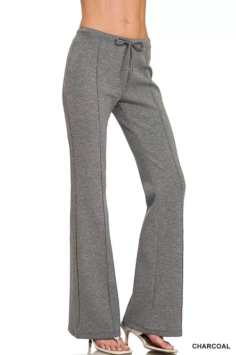 Charcoal drawstring waist pants with relaxed straight legs, side view