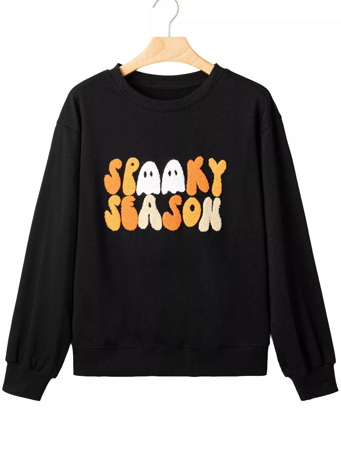 Black long-sleeve crewneck sweatshirt with embroidered orange “Spooky Season” lettering