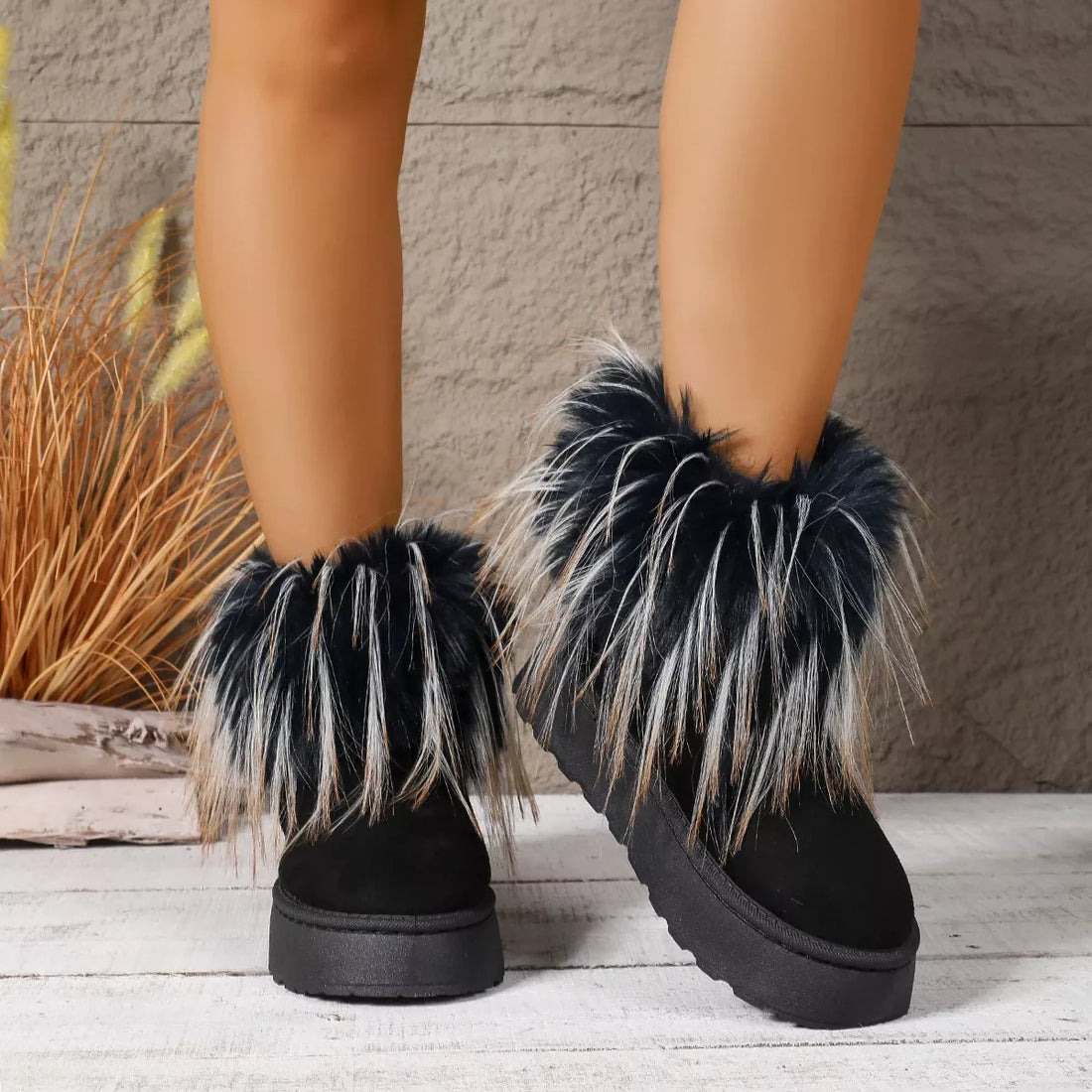 Black fuzzy-trim platform ankle boots with plush cuffs and rounded toe