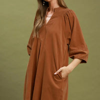 Camel brown corduroy V-neck shift dress with puff sleeves and front pocket