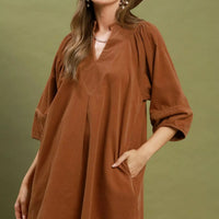 Camel brown corduroy V-neck shift dress with puff sleeves and front pockets