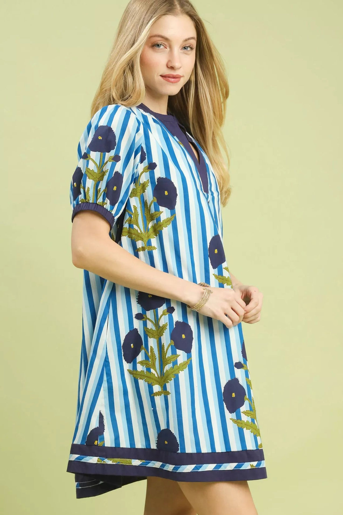 Blue striped short-sleeve dress with navy contrast hem and floral print