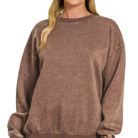 Brown fleece crewneck sweatshirt with long sleeves, ribbed cuffs and hem
