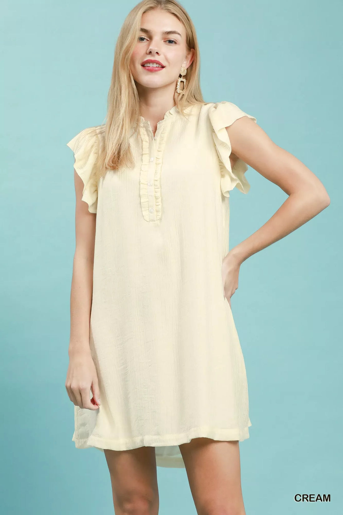 Cream ruffle-sleeve henley shift dress with button placket and short silhouette