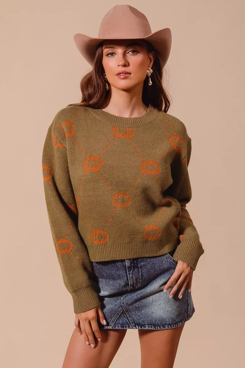 Olive crewneck pumpkin knit sweater with orange rhombus pattern, ribbed hem