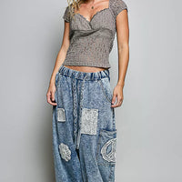 Grey lace sweetheart neck short-sleeve top with lace-trim neckline