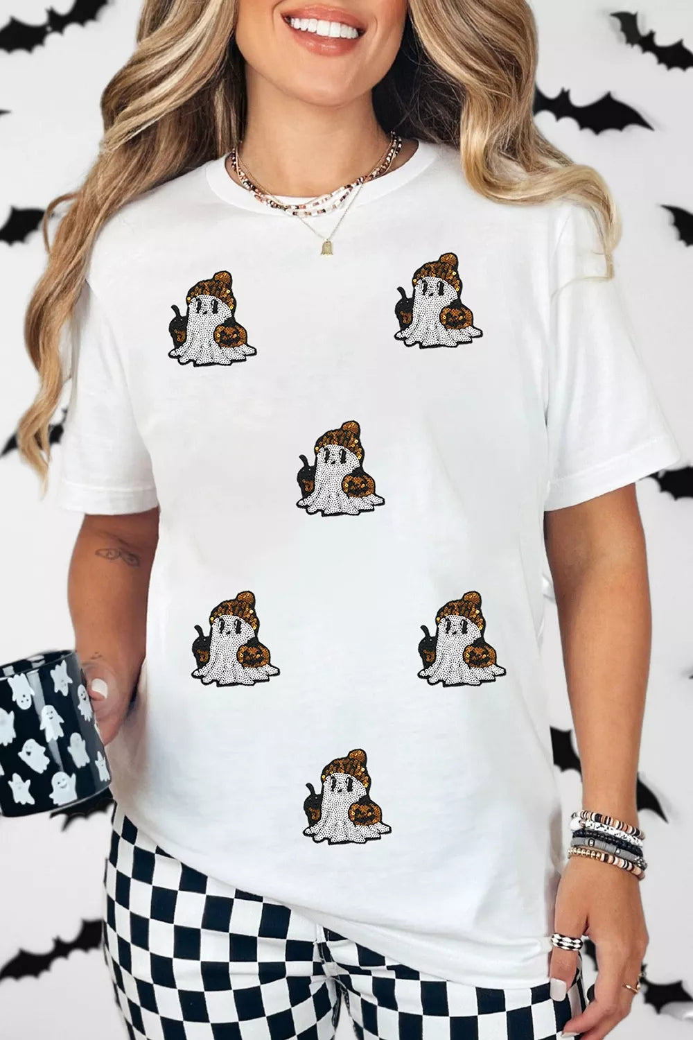 White short-sleeve t-shirt with multiple cartoon ghost dog patches front