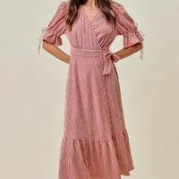 Red striped wrap midi dress with V-neck, puff sleeves, and tie waist