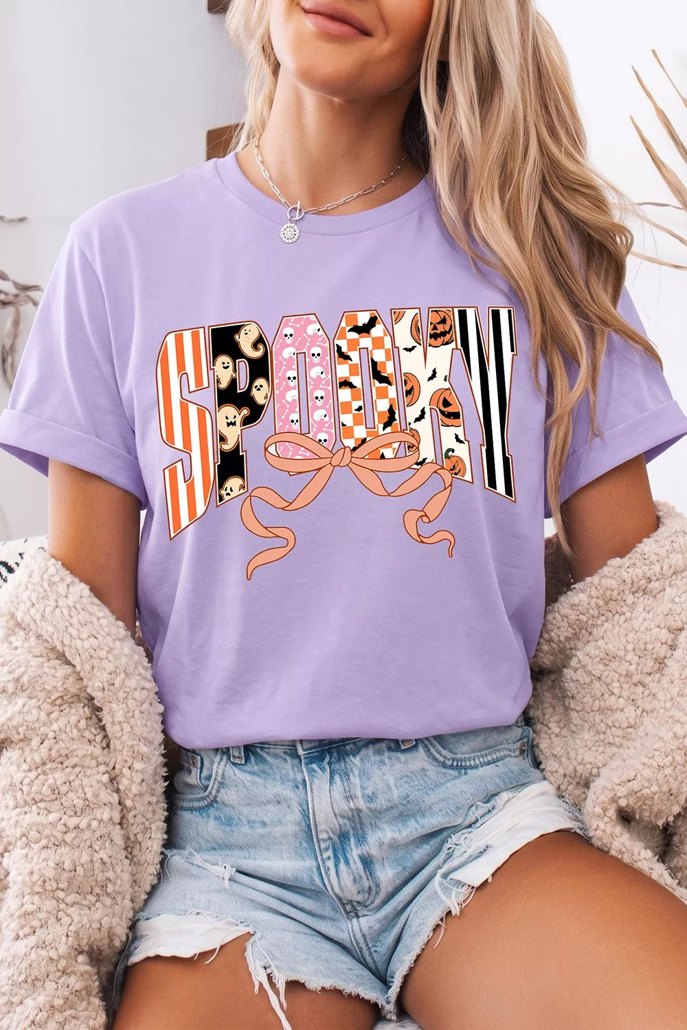 Lavender purple crew-neck T-shirt with Halloween letter graphic, front view
