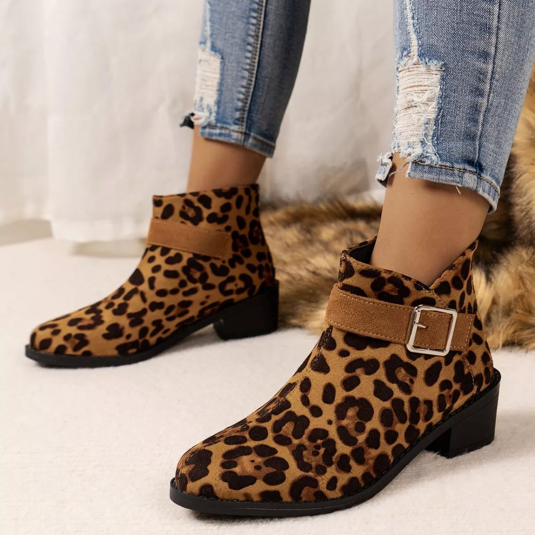 Leopard print point-toe block heel ankle boots with wide strap buckle detail