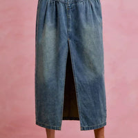 Washed denim pleated midi skirt with front slit and button fly detail
