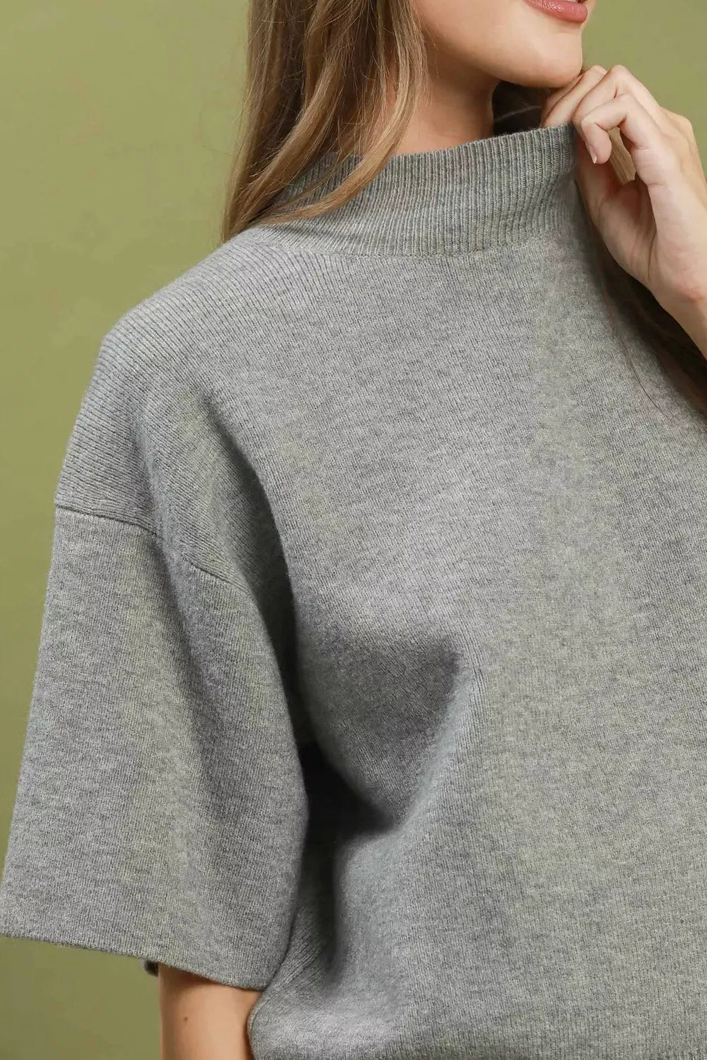 Grey mock-neck knit sweater top, ribbed collar detail