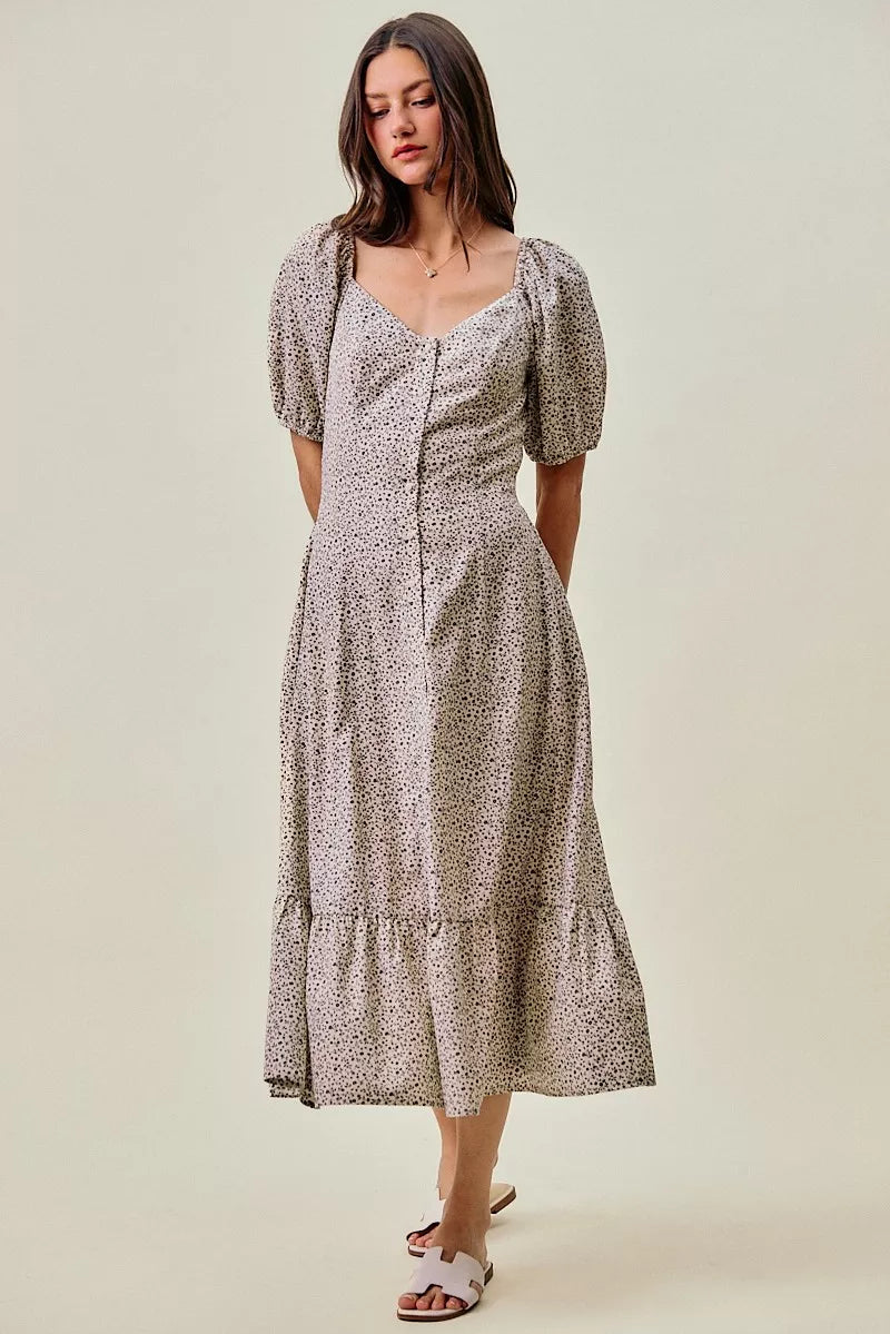 Ditsy floral midi dress front view, square neckline, puff sleeves, elastic waist