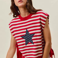 Red and ivory striped knit vest top with navy star patch at front, side tie accents