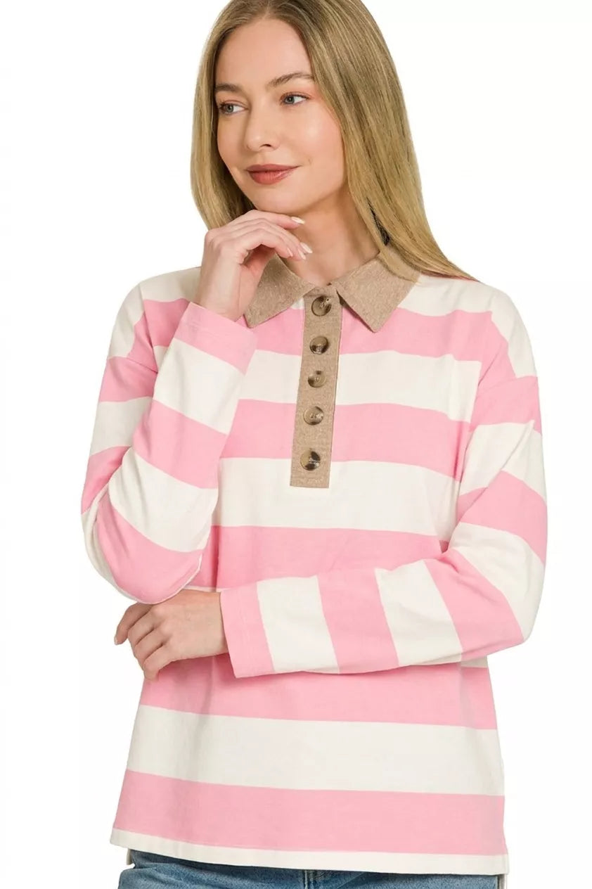 Pink and white striped polo top with contrast brown collar and button placket