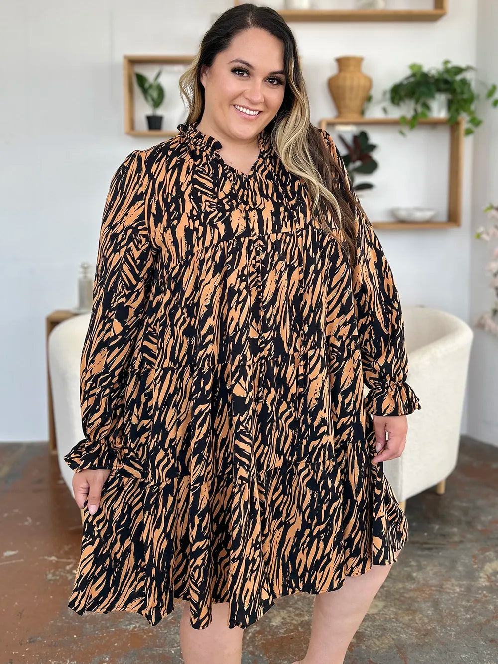 Caramel and black printed ruffle-hem long-sleeve dress, plus size, side view